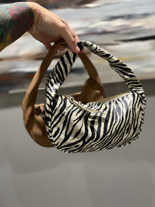 “Scoot Over” Shoulder Bag